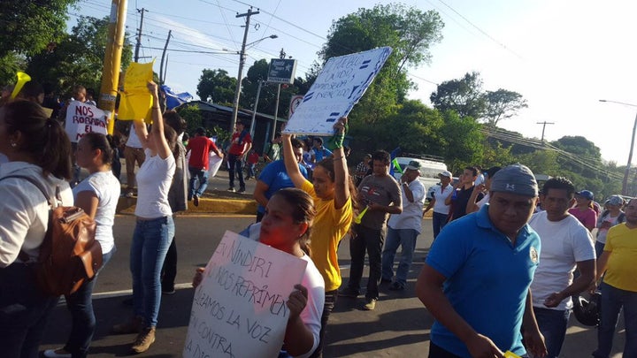 Demonstrators chant against social security cuts in Masaya, in western Nicaragua.