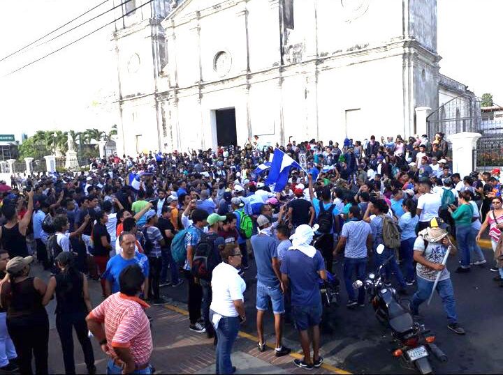 Protesters outside a cathedral in Managua.