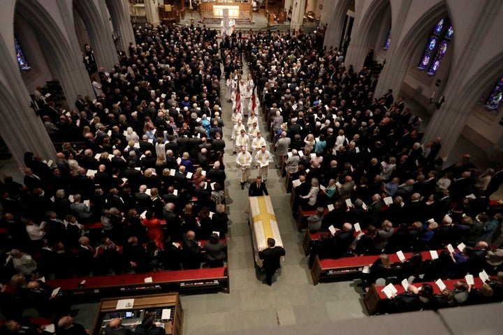 The casket of former first lady Barbara Bush is moved after funeral services at St. Martin's Episcopal Church in Houston, Tex