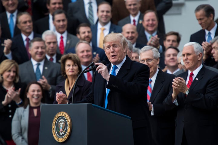 President Donald Trump praises the Republican tax cut on Dec. 20.