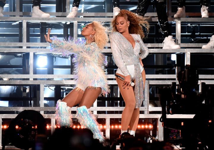 Solance Knowles and Beyonce, pictured during their Coachella performance, laughed off an onstage tumble.