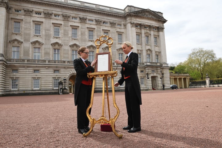 A notice is placed on an easel in the forecourt of Buckingham Palace in London to formally announce the birth of a baby boy to the Duke and Duchess of Cambridge at St Mary's Hospital