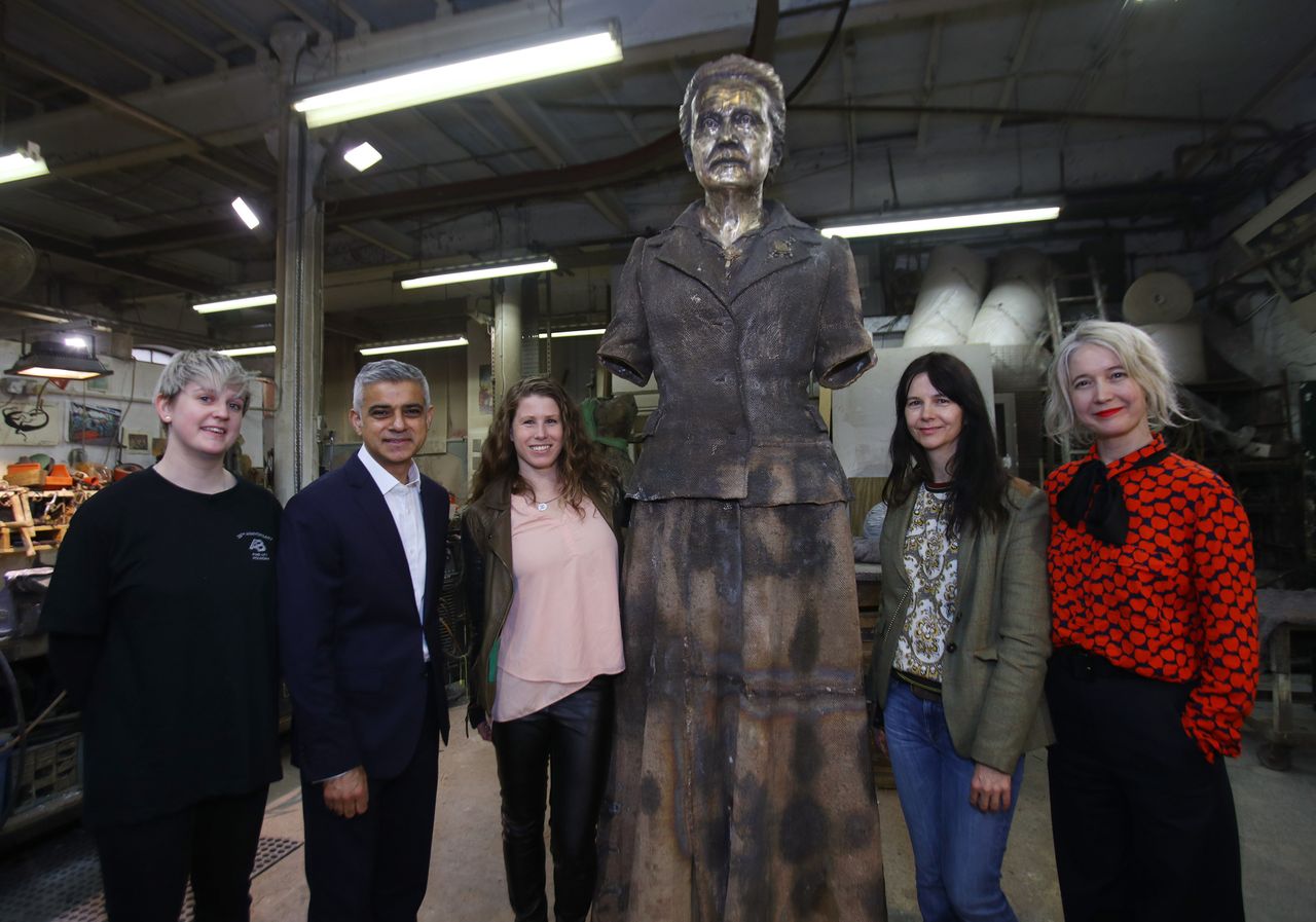 Technician Chloe Hughes, Mayor of London Sadiq Khan, Caroline Criado-Perez, artist Gillian Wearing, and Deputy Mayor for Culture and Creative Industries Justine Simons, during a visit to AB Fine Art Foundry, in east London, to see the finishing touches to a statue of suffragist leader Millicent Fawcett before its unveiling in Parliament Square.