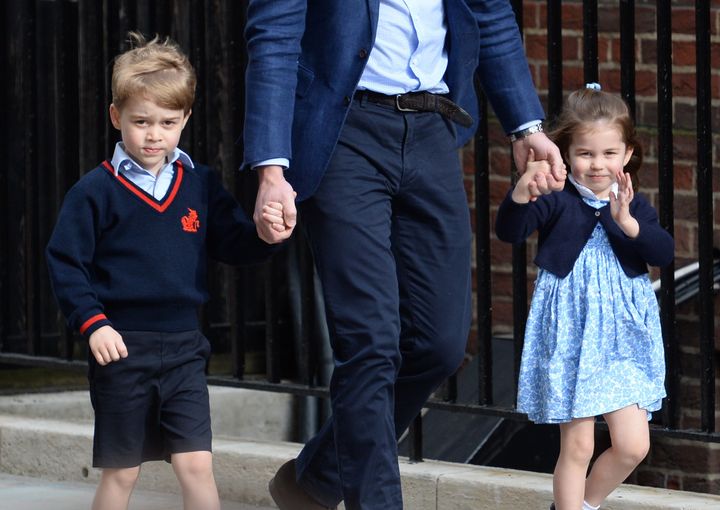 Prince George, William and Princess Charlotte arrive at St. Mary's Hospital.