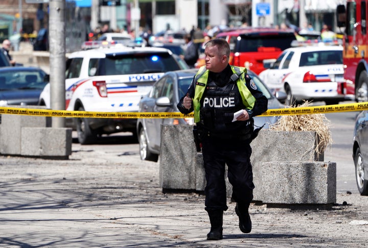 A police officer responds to the incident in the northern suburbs of Toronto.