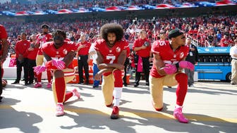 SANTA CLARA, CA - OCTOBER 23: Eli Harold #58, Colin Kaepernick #7 and Eric Reid #35 of the San Francisco 49ers kneel for the anthem prior to the game against the Tampa Bay Buccaneers at Levi Stadium on October 23, 2016 in Santa Clara, California. The Buccaneers defeated the 49ers 34-17. (Photo by Michael Zagaris/San Francisco 49ers/Getty Images) 