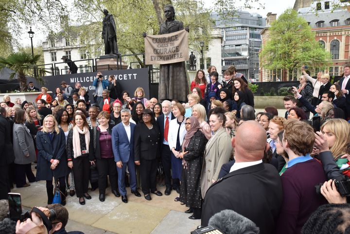 Emily Thornberry, Sadiq Khan, Jeremy Corbyn, Dawn Butler, Diane Abbott, Harriet Harman stand in front of the statue by Gillian Wearing.