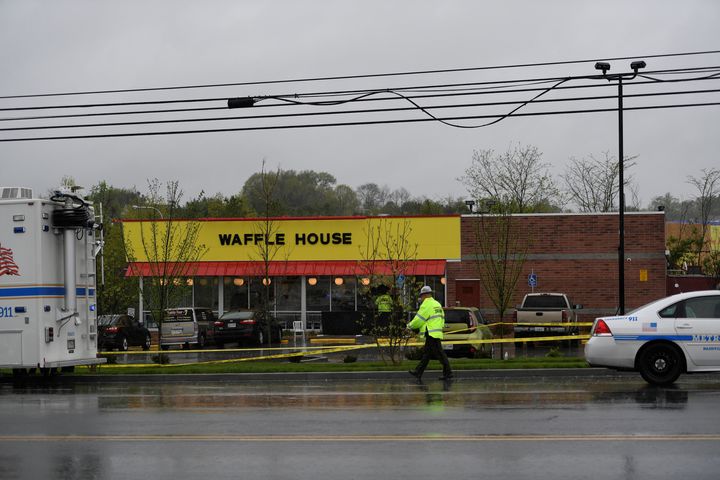 Police inspect the scene of the fatal shooting at a Waffle House restaurant near Nashville, Tennessee, on April 22.
