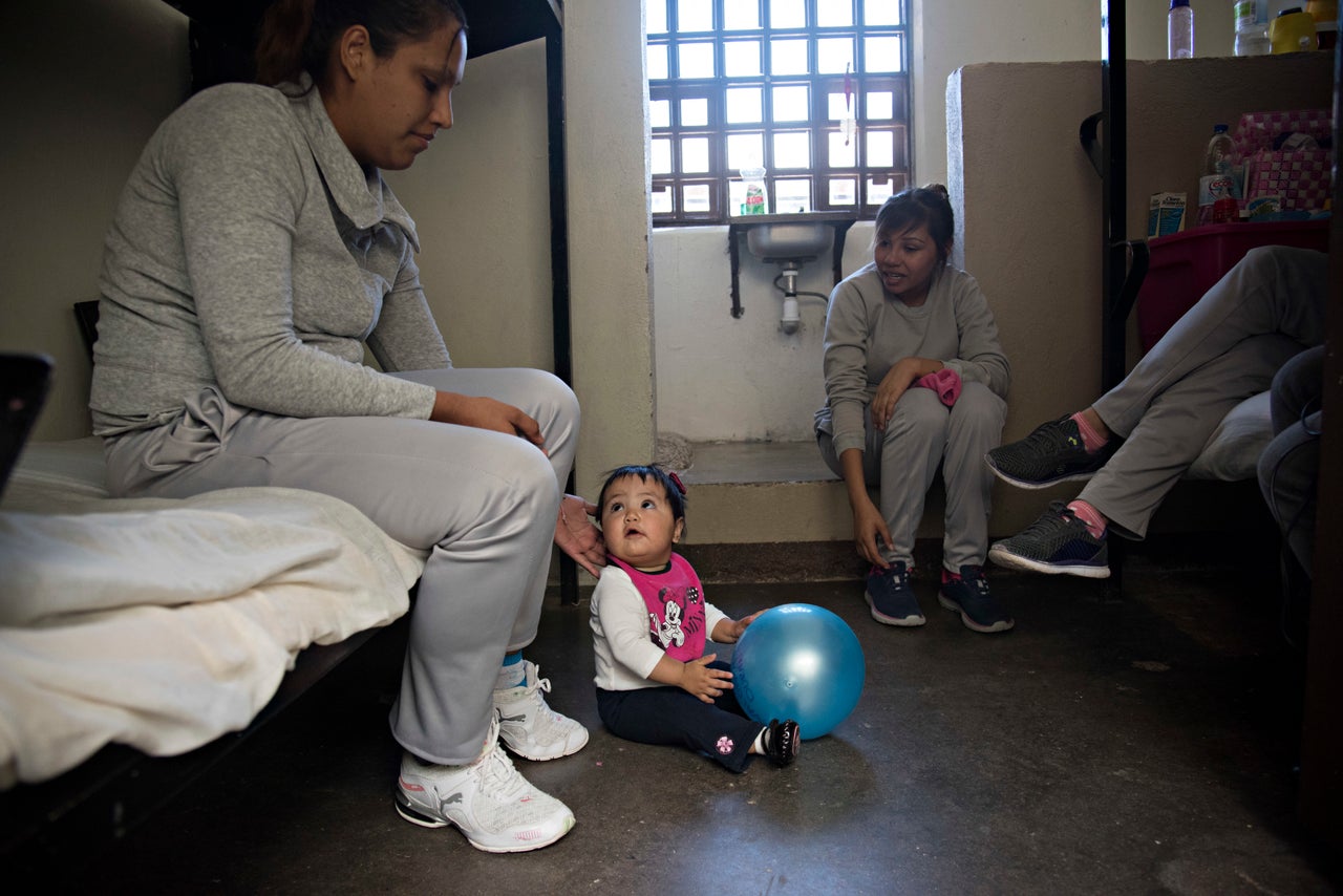 Isaura is 9 months old. She lives in a cell with her mother and two other inmates.