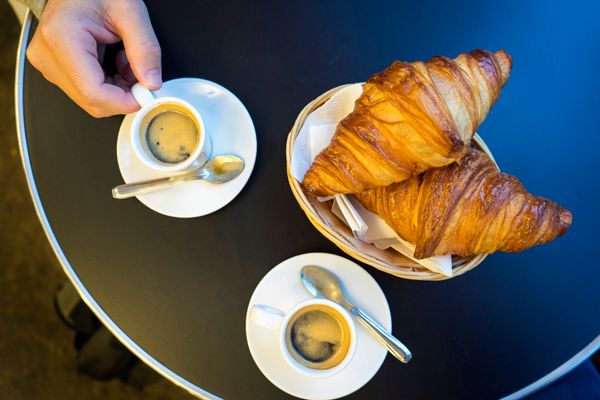 From croissants and espresso at a <i>brasserie</i>&nbsp;to cheese samples from a&nbsp;<i>fromagerie, </i>Paris is a non-negot