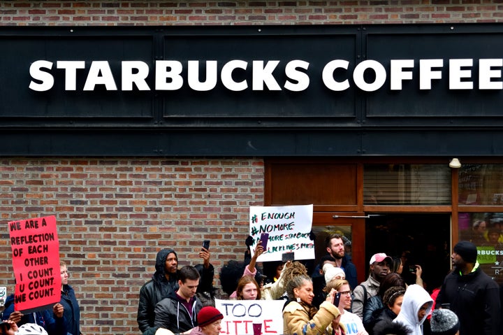 Protesters gather on April 15 at the Philadelphia Starbucks location where two black men were arrested days earlier.