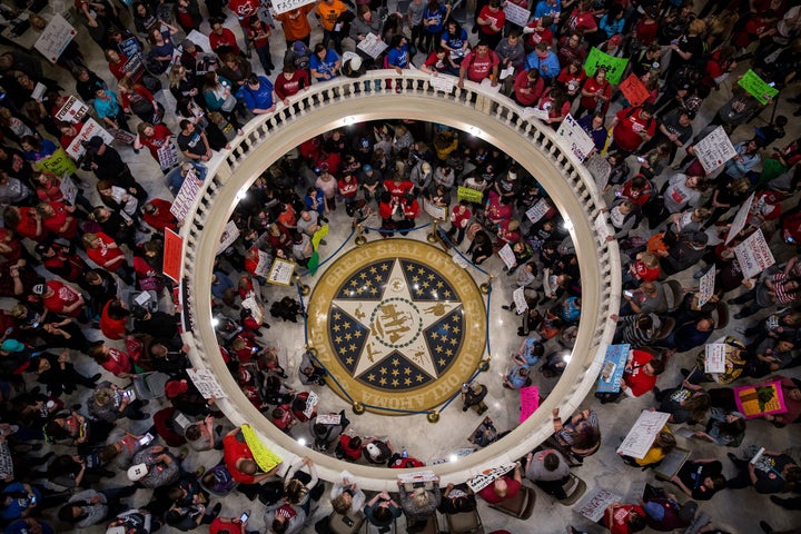 Teachers demand increased public school funding in the state Capitol in Oklahoma City on April 3.