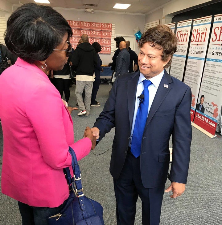 Democrat Shri Thanedar greets a voter at an April campaign event.