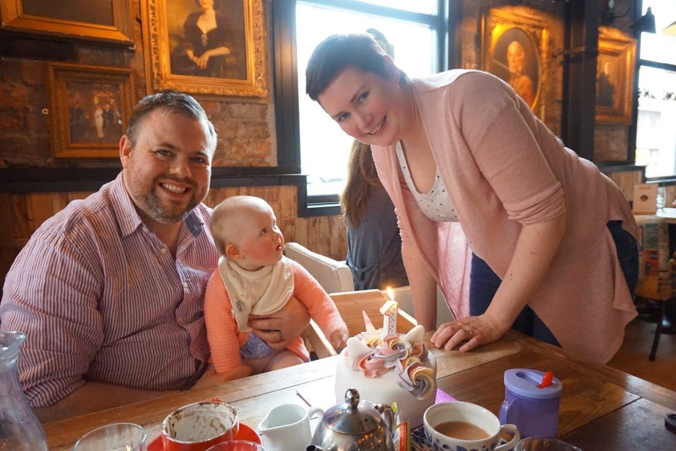 Sarah, her partner and her daughter Iris. 