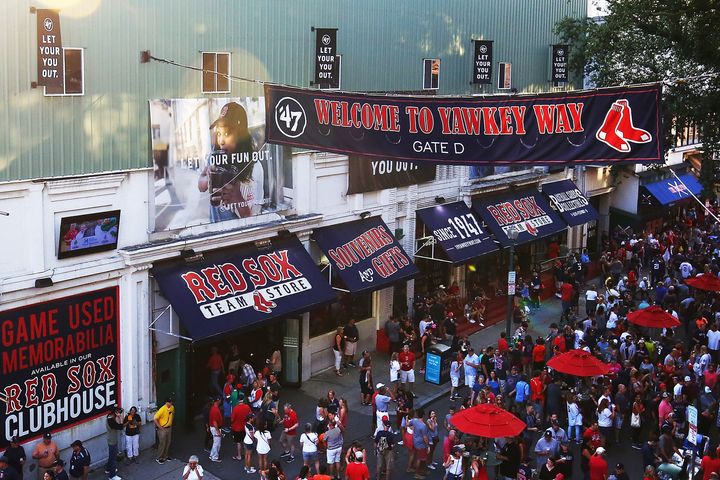 Yawkey Way is seen packed with sports fans before a baseball game at Fenway Park in 2017.