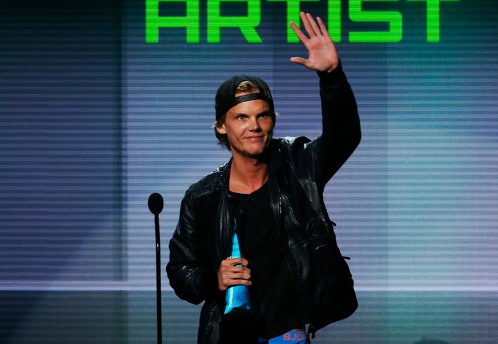 Avicii accepts the Favorite Electronic Dance Music Artist award at the 41st American Music Awards in Los Angeles, California November 24, 2013.