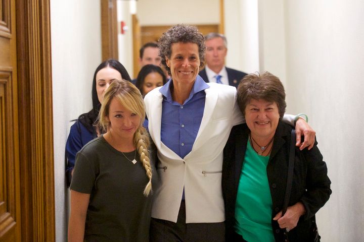 Andrea Constand (center) reacts after the verdict was delivered.