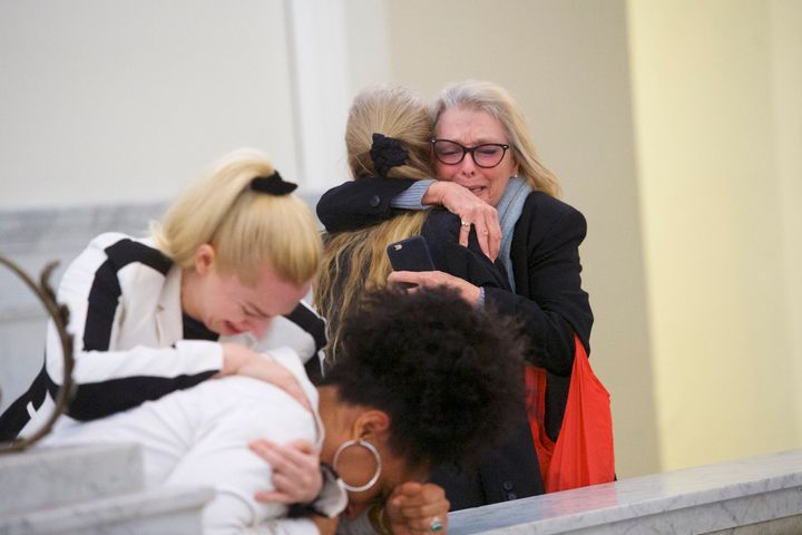 Bill Cosby's accusers embrace after the 80-year-old comedian was found guilty of three felony counts of aggravated indecent assault.