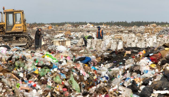 Workers sort waste at the Ecores waste processing enterprise on the outskirts of Minsk, March 12, 2015.
