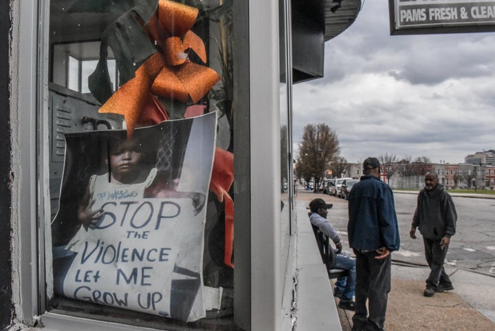 A store window in Baltimore. Maryland recently passed a law to fund violence prevention programs in urban areas.