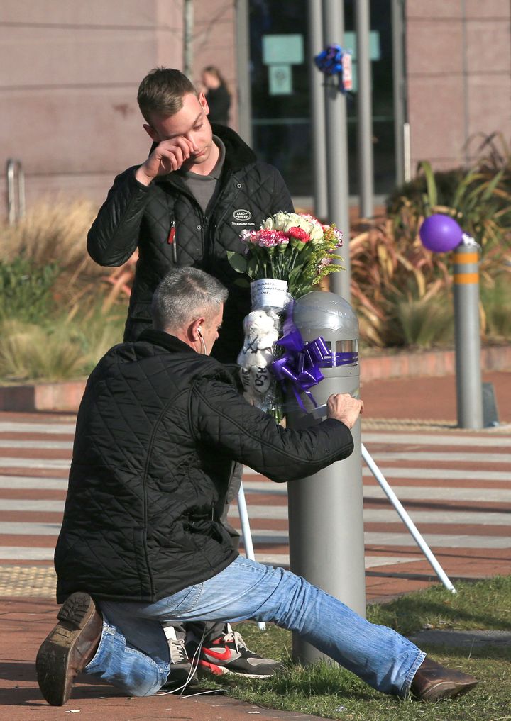 Supporters began to leave floral tributes outside the hospital on Saturday morning. Balloons, toys and candles were also placed outside, along with Italian and Polish flags.