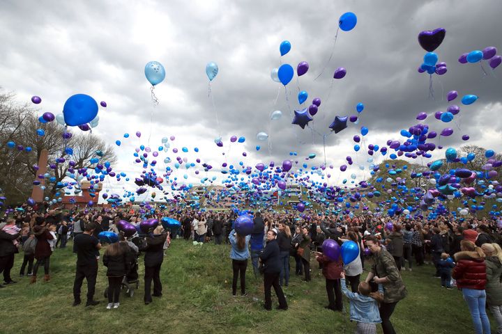 People release balloons outside Alder Hey Children's Hospital in Liverpool on Saturday.