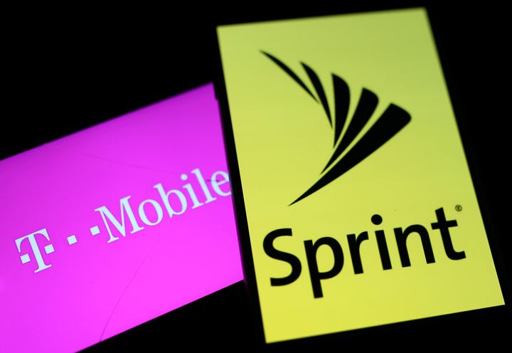 Smartphones with the logos of T-Mobile and Sprint are seen in this illustration taken September 19, 2017. (REUTERS/Dado Ruvic/Illustration)
