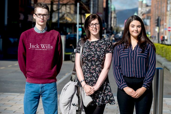 Siobhan McLaughlin (centre) and her children Billy and Rebecca Adams, as the trio arrive at the Royal Courts of Justice in Belfast.