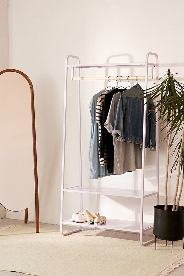 Clothing rack with discount shelves