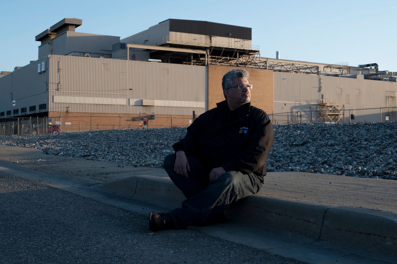Reyes sits outside the GM Flint Assembly Plant, where he works as an electrician, April 29.