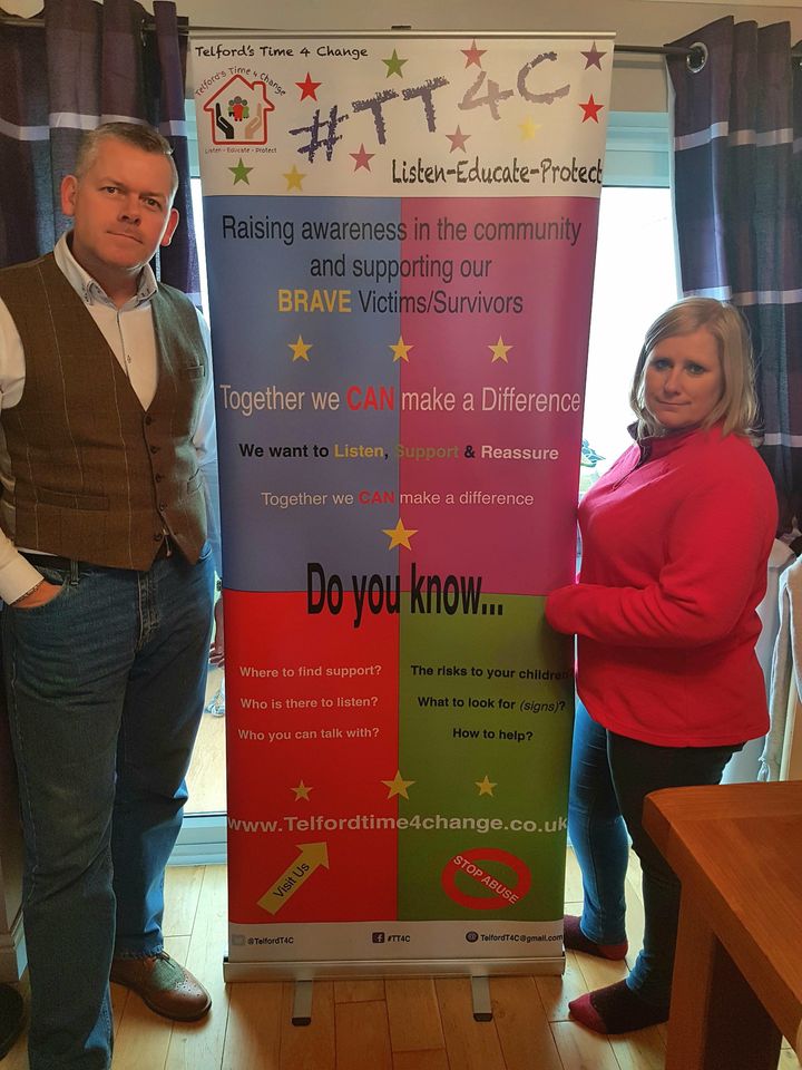 Craig and Anji with a poster designed for TT4C