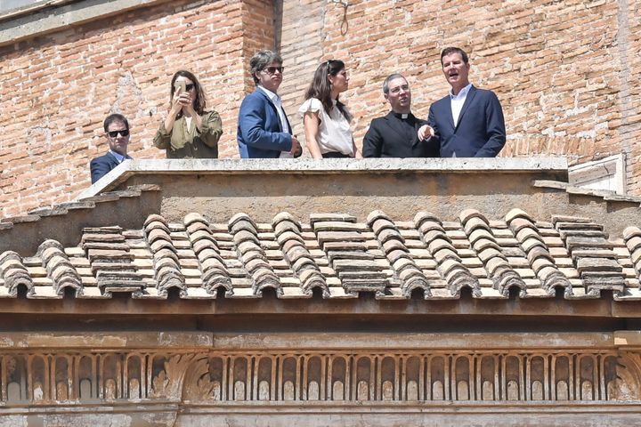 Chilean sexual abuse victims José Andrés Murillo, left, with his wife; James Hamilton, center, with his wife; and Juan Carlos Cruz, right, on the terrace of the Apostolic Palace as they attend the Sunday Angelus prayer delivered by the pope at St. Peter's Square at the Vatican on April 29.