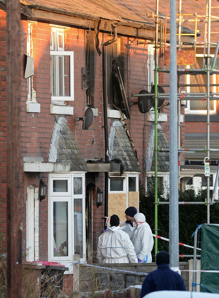 <strong>Forensic officers at the scene of the Jackson Street fire on 11 December 2017</strong>
