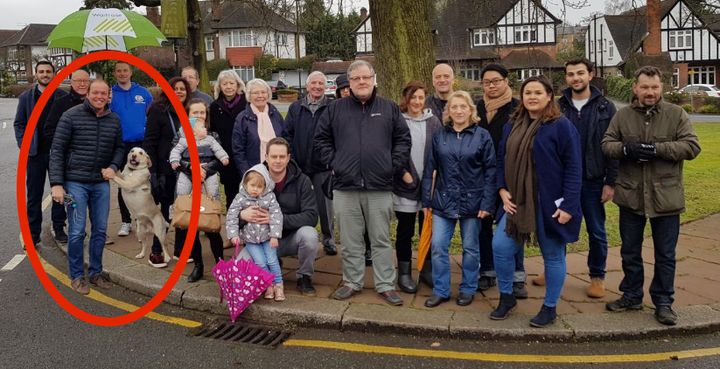 David Furrowes appears alongside local campaigners about a dangerous road junction with his floating dog.
