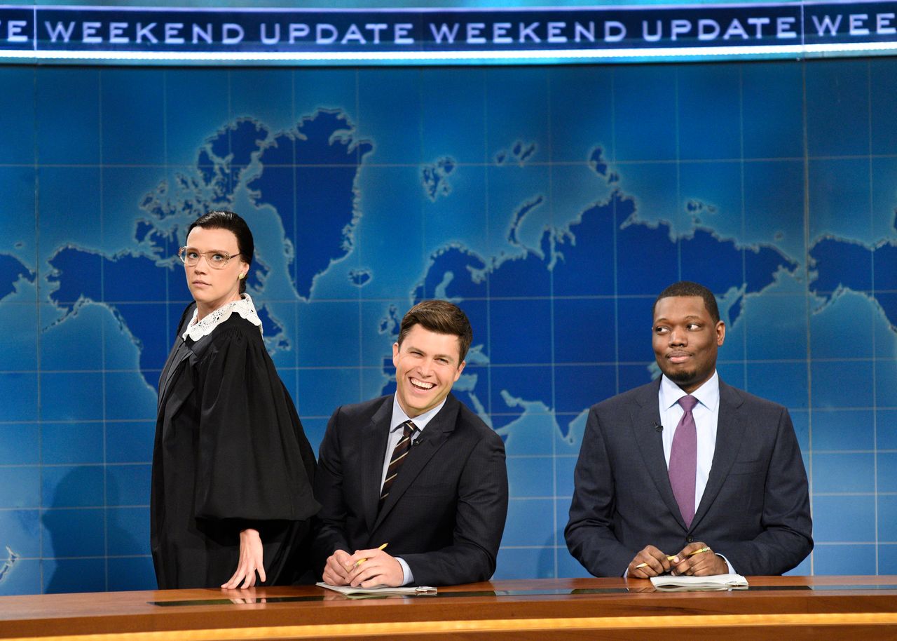 From left, Kate McKinnon as Ginsburg with Colin Jost and Michael Che during "Saturday Night Live" on Oct. 7, 2017.