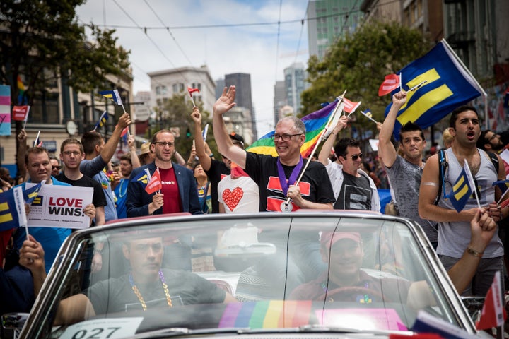 Supreme Court plaintiff Jim Obergefell rides in a convertible in the San Francisco Gay Pride Parade on June 28, 2015. Obergefell won a landmark Supreme Court decision that allowed same-marriages across the United States.