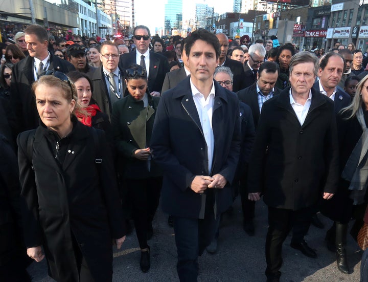 Canadian Prime Minister Justin Trudeau, Governor General Julie Payette and Toronto Mayor John Tory walk to a vigil for the Toronto attack victims on April 29, 2018. 