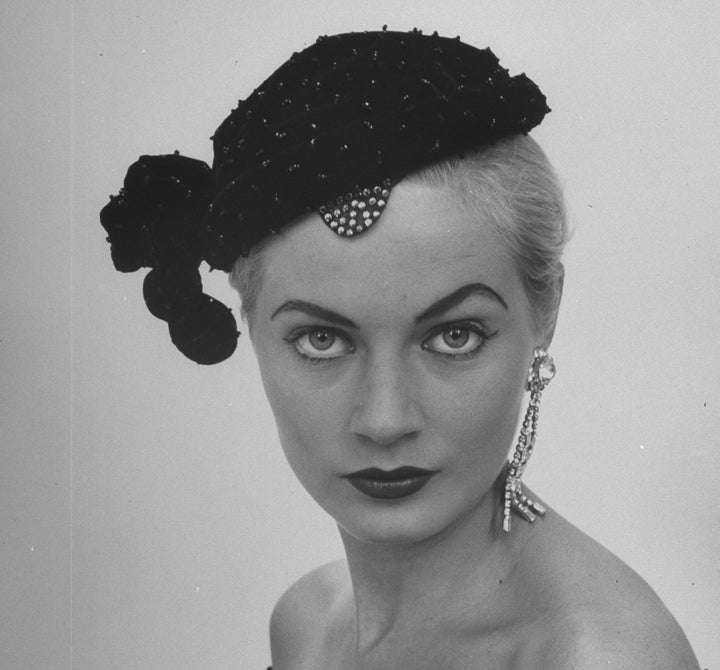 Swedish model Anita Ekberg wearing a beaded cocktail hat in the 1950s.