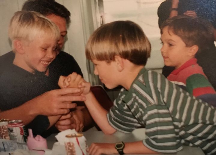 Nick Foles (far left) arm wrestling my brother, Taylor, in the '90s. 