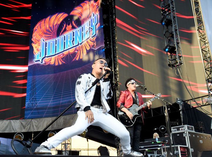 Arnel Pineda and Neal Schon at a Journey show in Los Angeles in 2017.