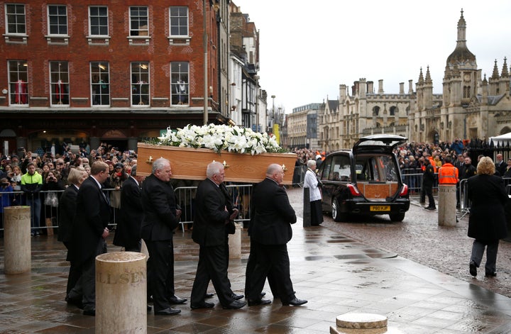 Pallbearers carry the coffin out of Great St Marys Church at the end of the funeral of theoretical physicist Stephen Hawking,