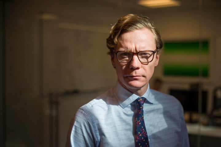 Alexander Nix, who was suspended as Cambridge Analytica's CEO in March, is seen at the company's New York City office in