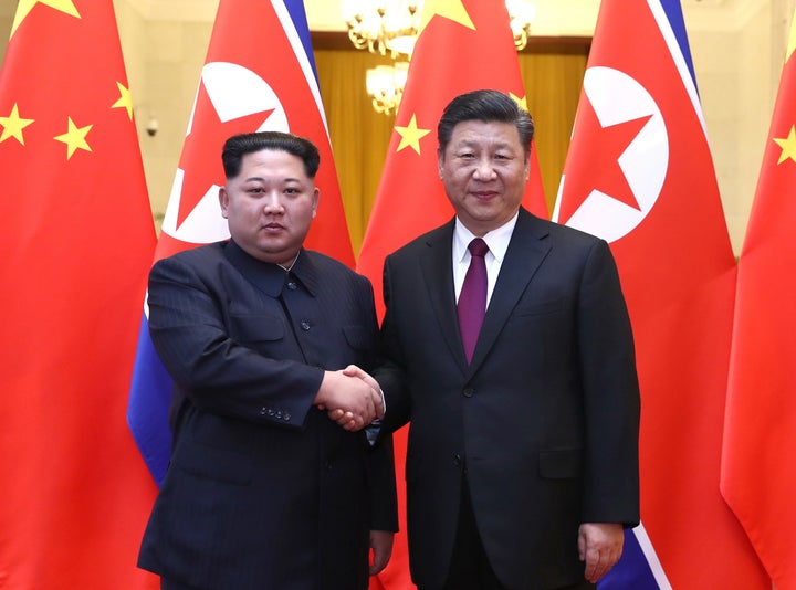 North Korean leader Kim Jong Un meets with Chinese President Xi Jinping in Beijing on March 28, 2018.