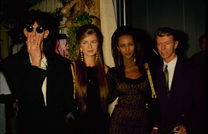 Another moment at the AIDS benefit, with Iman and David Bowie.
