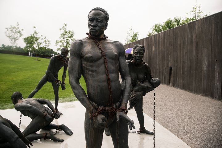 A sculpture of enslaved people at the entrance to the National Memorial for Peace and Justice.