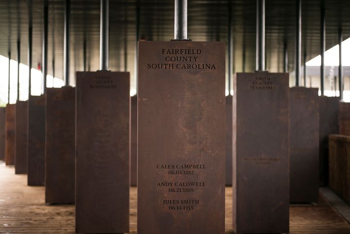 At the National Memorial for Peace and Justice in Montgomery, Alabama, markers display the names and locations of people killed by lynching.