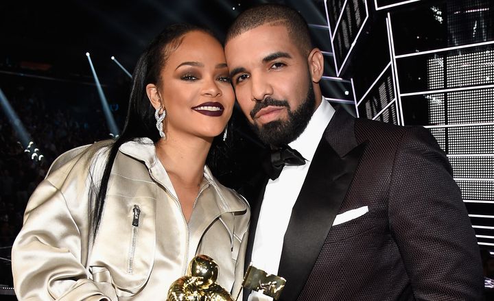 Rihanna and rapper Drake pose onstage during the 2016 MTV Video Music Awards