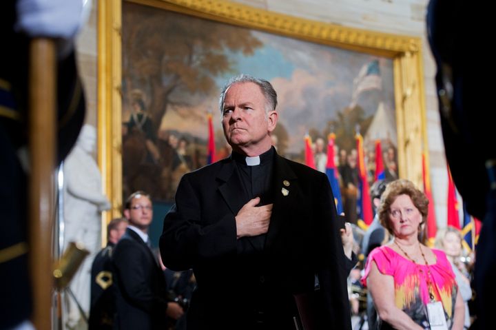 Rev. Patrick Conroy, chaplain of the House, attending the 2013 National Days of Remembrance ceremony to honor the victims of the Holocaust. 