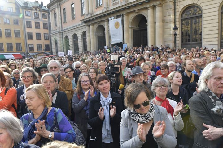 People gather at Stortorget square in Stockholm during a Swedish Academy meeting in April to support former permanent secretary Sara Danius who stood down