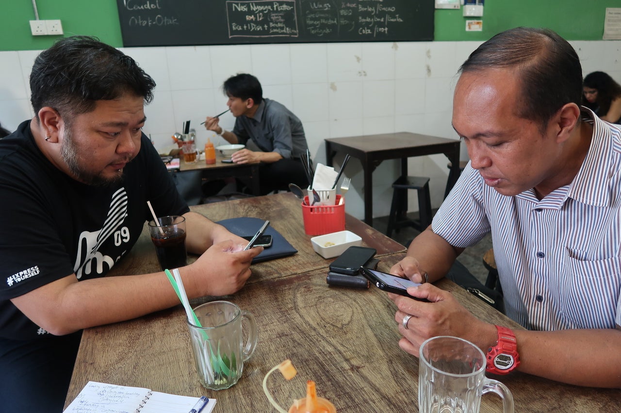 Lee (left) and Mahshar are involved in efforts to make Malaysia's upcoming midweek election more accessible to voters.